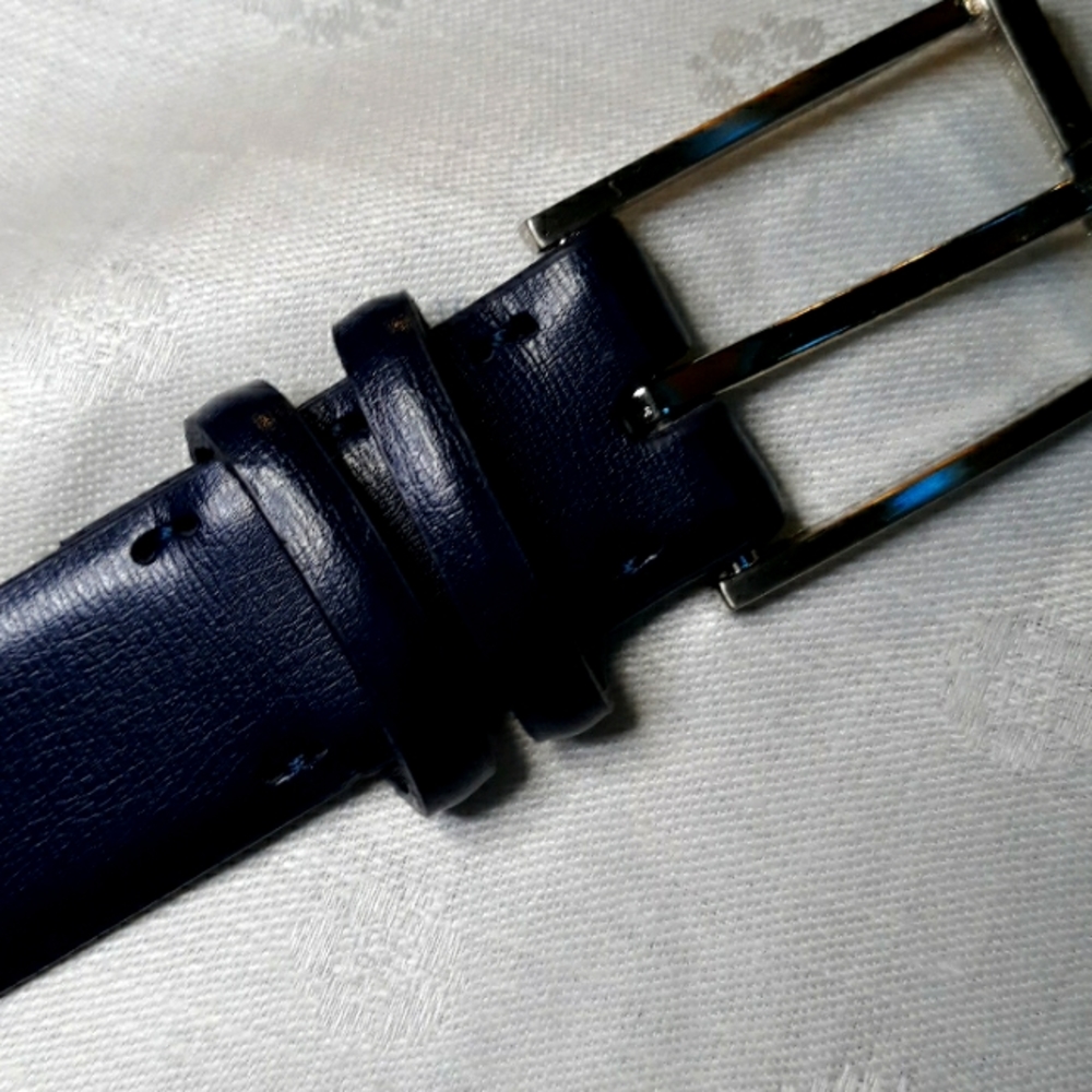 Calvin Klein dark blue leather belt. 34 inches long